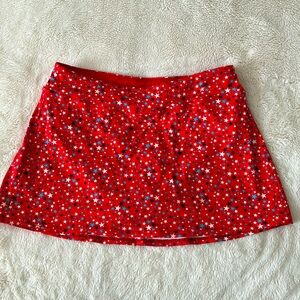 Lands’ End swim skirt size 8
Red stars print.